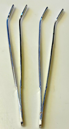 Stamp tongs bent - spade, tip
